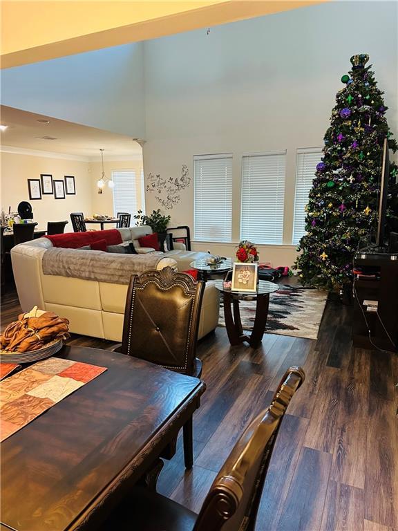 1393 Shipyard Dr, Slidell, LA 70461 - dining area featuring ornamental molding and dark wood-type flooring