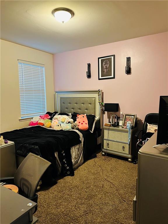 1393 Shipyard Dr, Slidell, LA 70461 - bedroom with carpet flooring and an office area