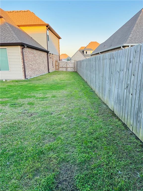 1393 Shipyard Dr, Slidell, LA 70461 - view of fenced backyard