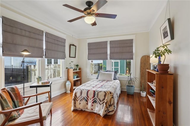 4462 Lafaye St, New Orleans, LA 70122 - bedroom with hardwood / wood-style floors, baseboards, and ornamental molding