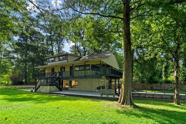 10152 Lawrence Rd, Hammond, LA 70403 - rear view of house featuring stairs, a patio, and a deck