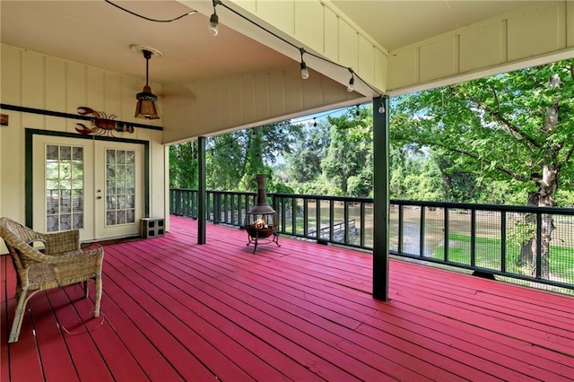 10152 Lawrence Rd, Hammond, LA 70403 - wooden deck with french doors and view of scattered trees