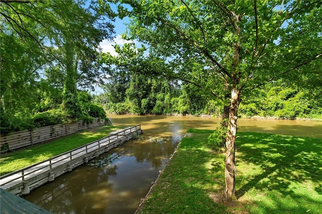 10152 Lawrence Rd, Hammond, LA 70403 - view of community featuring a lawn and a water view