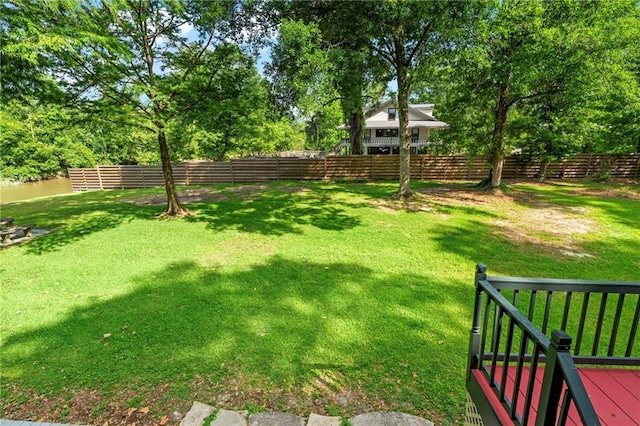 10152 Lawrence Rd, Hammond, LA 70403 - view of yard with view of wooded area and a wooden deck