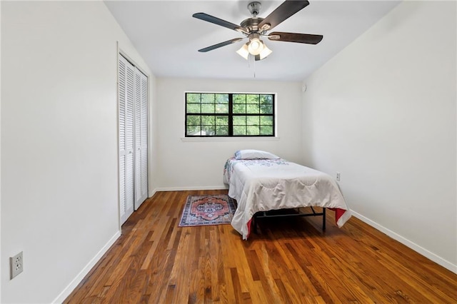 10152 Lawrence Rd, Hammond, LA 70403 - bedroom with a closet, wood finished floors, baseboards, and a ceiling fan