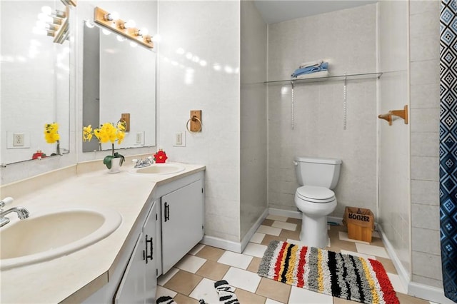 10152 Lawrence Rd, Hammond, LA 70403 - full bath with toilet, double vanity, and tiled shower