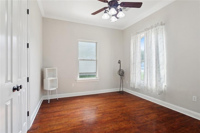 117 Coushatta Cir, Madisonville, LA 70447 - unfurnished room with dark wood-type flooring, ceiling fan, baseboards, and ornamental molding
