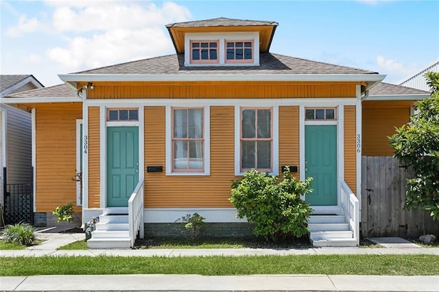 330406 Conti St, New Orleans, LA 70119 - bungalow-style house featuring entry steps and a shingled roof
