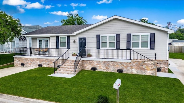 234 Murray Hill Dr, Destrehan, LA 70047 - single story home with a front yard, french doors, stairs, and a porch