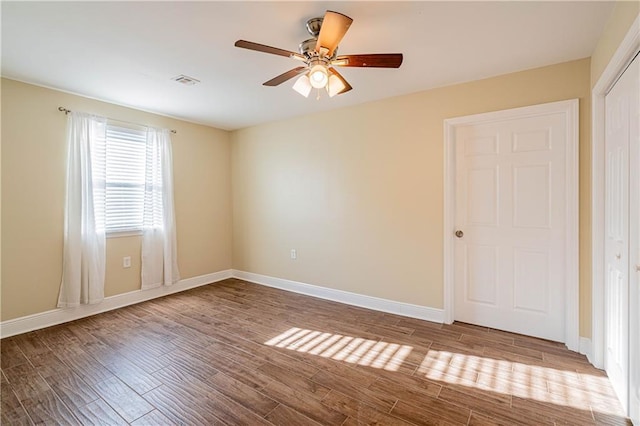 234 Murray Hill Dr, Destrehan, LA 70047 - unfurnished room featuring a ceiling fan, wood finished floors, and baseboards