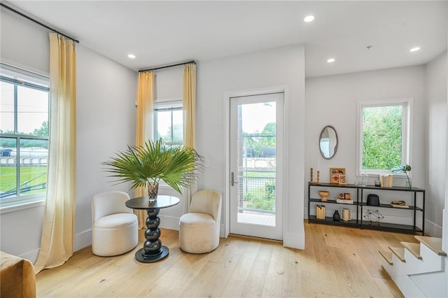 3431 Chartres St Unit 3, New Orleans, LA 70117 - doorway to outside featuring plenty of natural light, light wood-style floors, baseboards, and recessed lighting