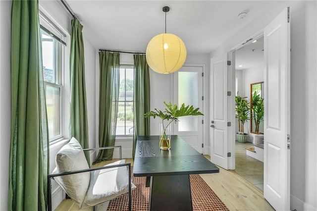 3431 Chartres St Unit 3, New Orleans, LA 70117 - dining room with light wood-style flooring