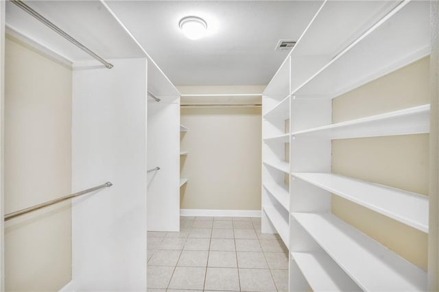 711921 Marshal Foch St, New Orleans, LA 70124 - spacious closet with light tile patterned floors