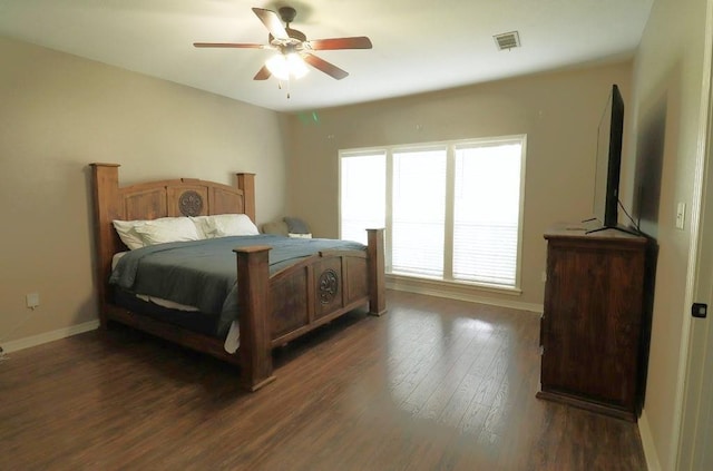 14370 Hickory Dr, Ponchatoula, LA 70454 - bedroom featuring wood finished floors, baseboards, and a ceiling fan
