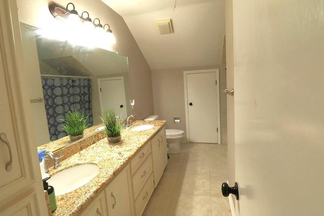 14370 Hickory Dr, Ponchatoula, LA 70454 - bathroom with toilet, vaulted ceiling, tile patterned flooring, double vanity, and a shower with curtain