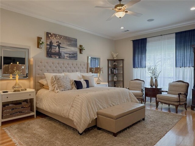 2044 S Lakeshore Blvd, Slidell, LA 70461 - bedroom with ornamental molding, wood finished floors, recessed lighting, and a ceiling fan