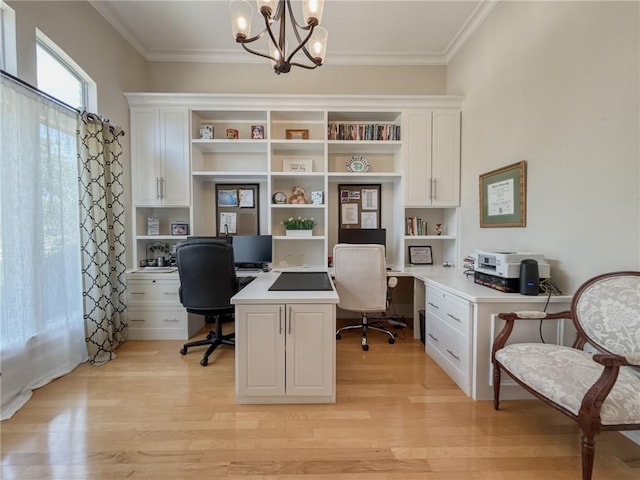 2044 S Lakeshore Blvd, Slidell, LA 70461 - office area featuring built in desk, crown molding, a chandelier, and light wood-style floors