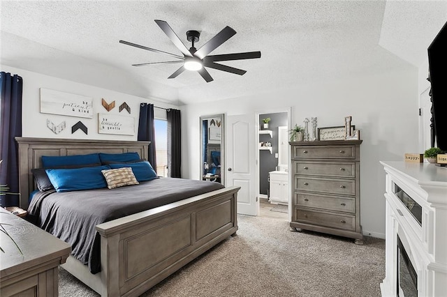 4824 Grand Bayou Dr, Marrero, LA 70072 - bedroom with a fireplace, a textured ceiling, light colored carpet, ensuite bathroom, and a ceiling fan