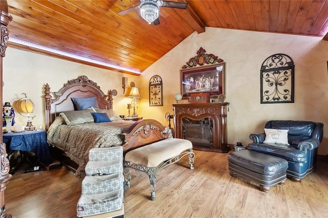 42 Richelle St, Waggaman, LA 70094 - bedroom featuring wooden ceiling, wood finished floors, a fireplace, and ceiling fan