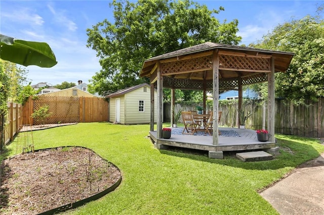 918 Harmony St, New Orleans, LA 70115 - view of yard featuring a gazebo, a deck, and an outbuilding