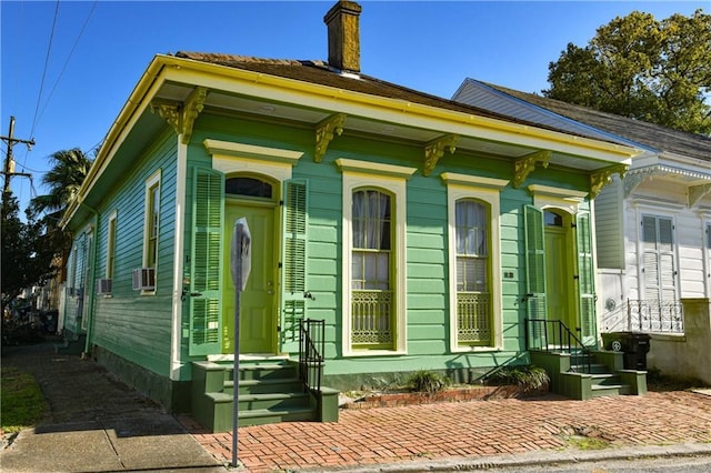 1438-40 Marais St, New Orleans, LA 70116 - view of front of house featuring a chimney