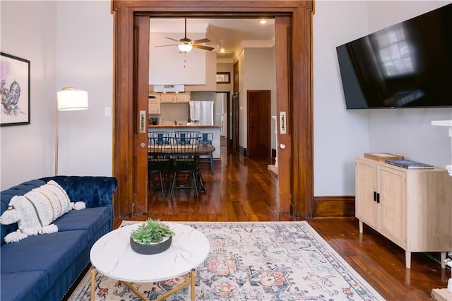 1438-40 Marais St, New Orleans, LA 70116 - living room with wood finished floors, a ceiling fan, ornamental molding, and baseboards