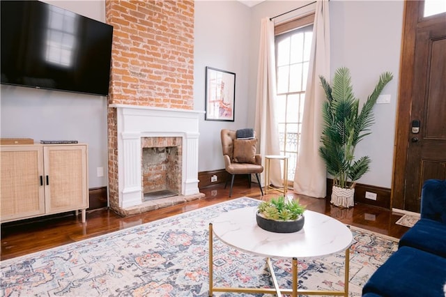 1438-40 Marais St, New Orleans, LA 70116 - living area featuring wood finished floors and a fireplace