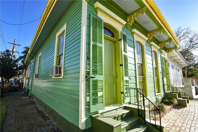 1438-40 Marais St, New Orleans, LA 70116 - view of side of property with a patio area and cooling unit