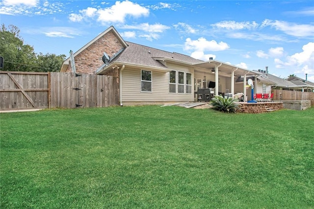 113 Kasey St, Slidell, LA 70458 - rear view of property with a patio, roof with shingles, and a ceiling fan