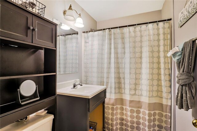 6223 Wainwright Dr, New Orleans, LA 70122 - bathroom featuring vanity and a shower with shower curtain