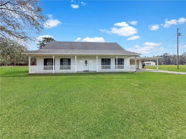 20 Sunset Ln, Carriere, MS 39426 - farmhouse-style home featuring covered porch, a carport, a front lawn, and driveway