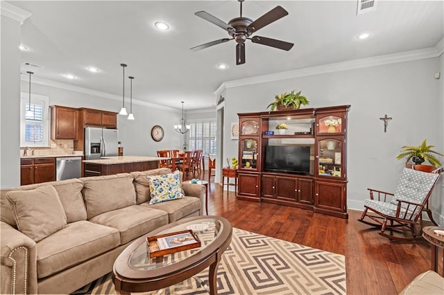 789 Rue St Germain St, Covington, LA 70433 - living room with dark wood-type flooring, ceiling fan, plenty of natural light, recessed lighting, and ornamental molding