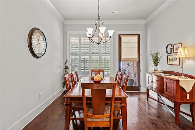 789 Rue St Germain St, Covington, LA 70433 - dining space with a chandelier, dark wood-style floors, crown molding, and baseboards