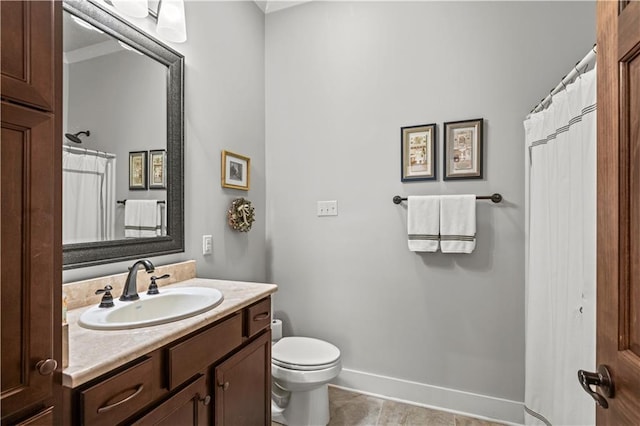 789 Rue St Germain St, Covington, LA 70433 - full bath with vanity, toilet, tile patterned flooring, and baseboards