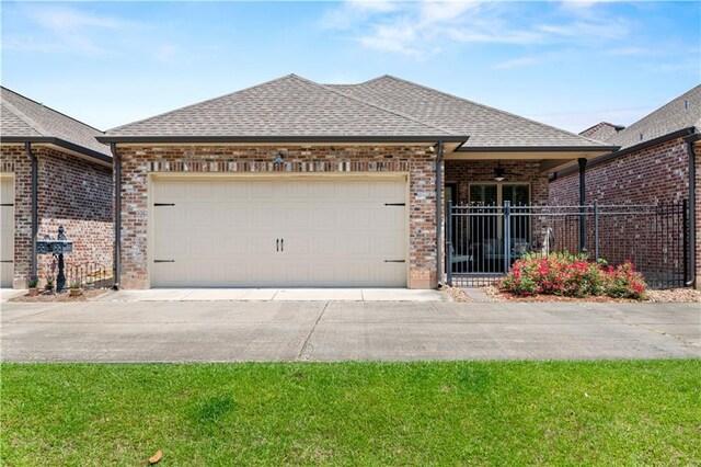 789 Rue St Germain St, Covington, LA 70433 - view of front of property featuring brick siding, an attached garage, roof with shingles, and concrete driveway