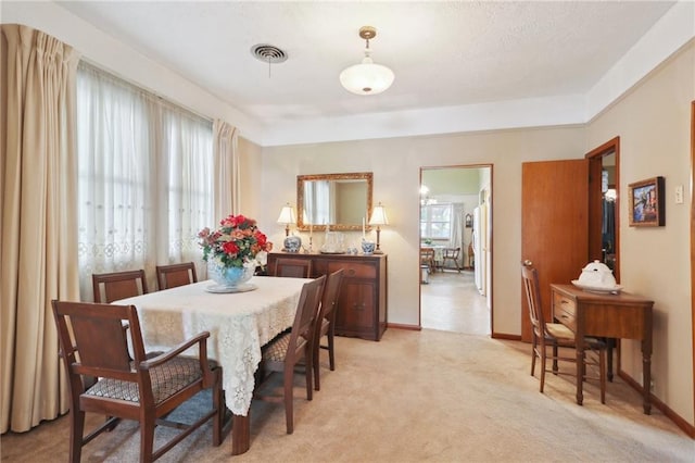 11 Gelbke Dr, Gretna, LA 70053 - dining space with light carpet and baseboards