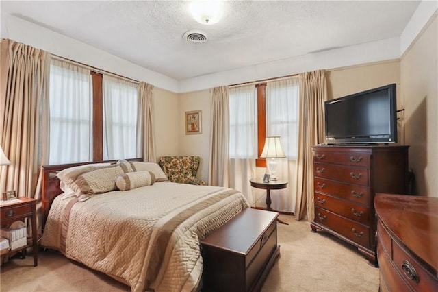 11 Gelbke Dr, Gretna, LA 70053 - bedroom with light colored carpet and a textured ceiling