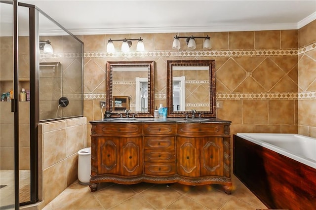 4525 Beau Lac Ln, Metairie, LA 70002 - bathroom with tile walls, double vanity, tile patterned floors, a stall shower, and a bath