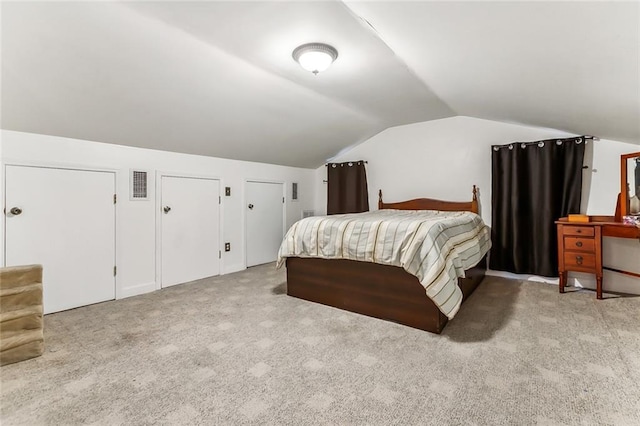 4525 Beau Lac Ln, Metairie, LA 70002 - carpeted bedroom with vaulted ceiling and two closets