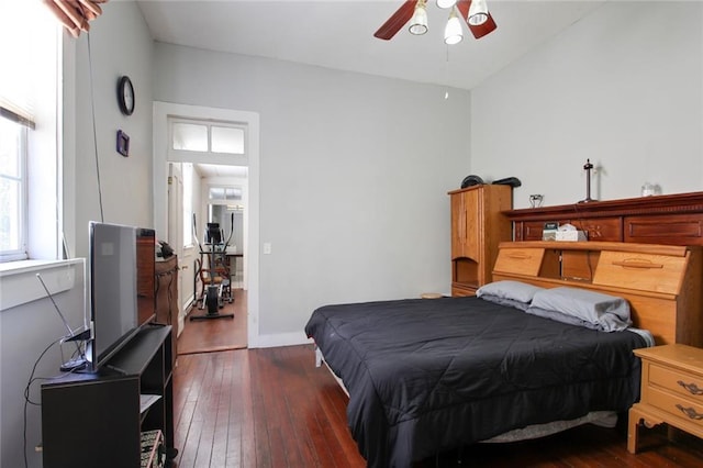 232830 Frenchmen St, New Orleans, LA 70119 - bedroom with dark wood-type flooring and a ceiling fan