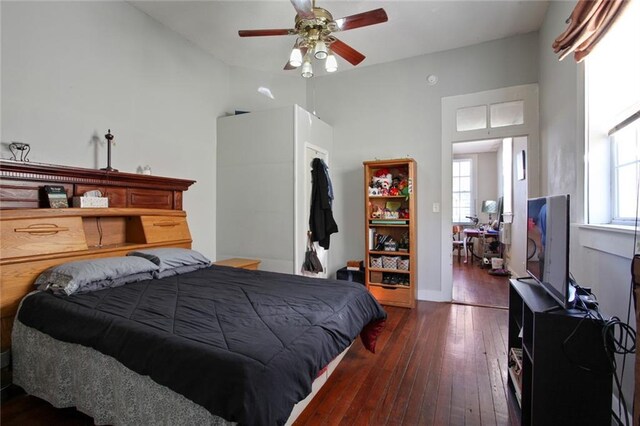 232830 Frenchmen St, New Orleans, LA 70119 - bedroom featuring hardwood / wood-style flooring, vaulted ceiling, and ceiling fan