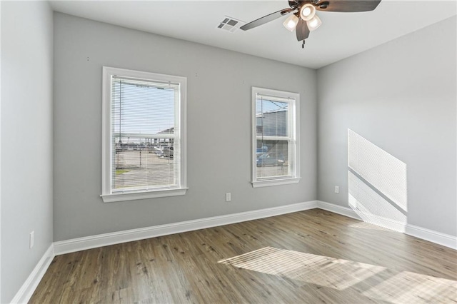 220 Trudeau Dr, Metairie, LA 70003 - unfurnished room with wood finished floors, ceiling fan, and baseboards
