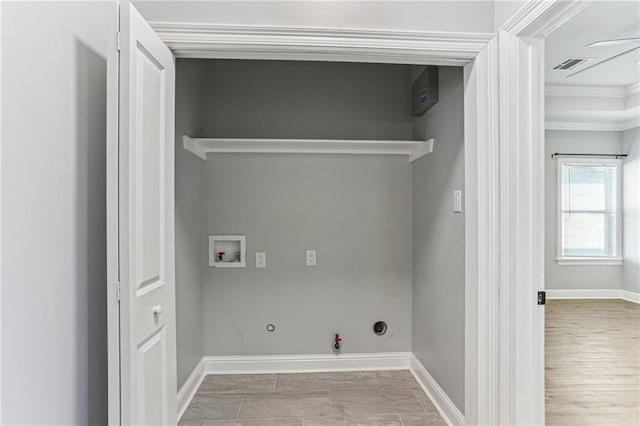 220 Trudeau Dr, Metairie, LA 70003 - laundry room with hookup for a gas dryer, baseboards, washer hookup, and ornamental molding