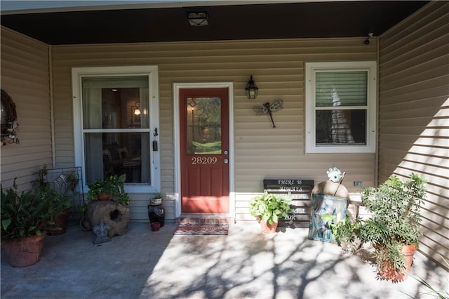 28230 Stanga Rd, Ponchatoula, LA 70454 - doorway to property featuring covered porch