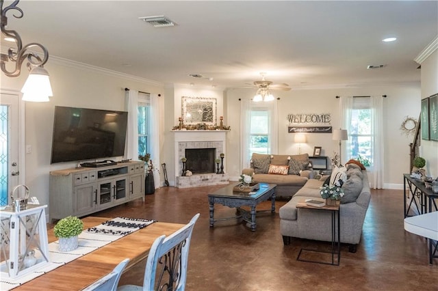 28230 Stanga Rd, Ponchatoula, LA 70454 - living room with ornamental molding, a brick fireplace, ceiling fan, finished concrete flooring, and baseboards