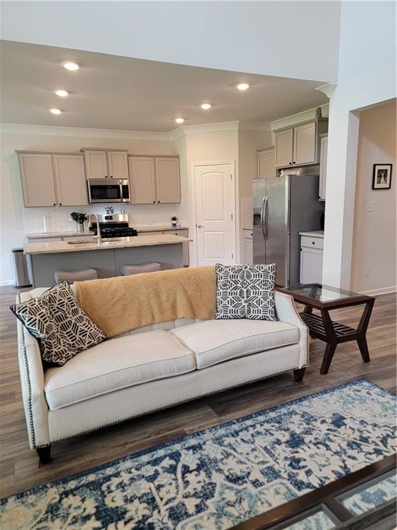 40315 Cypress Reserve Blvd, Ponchatoula, LA 70454 - living area featuring ornamental molding, dark wood-type flooring, recessed lighting, and baseboards