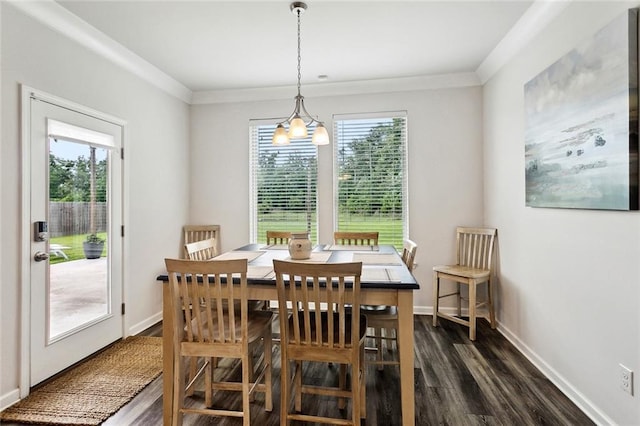40315 Cypress Reserve Blvd, Ponchatoula, LA 70454 - dining room featuring dark wood-style flooring, ornamental molding, and baseboards