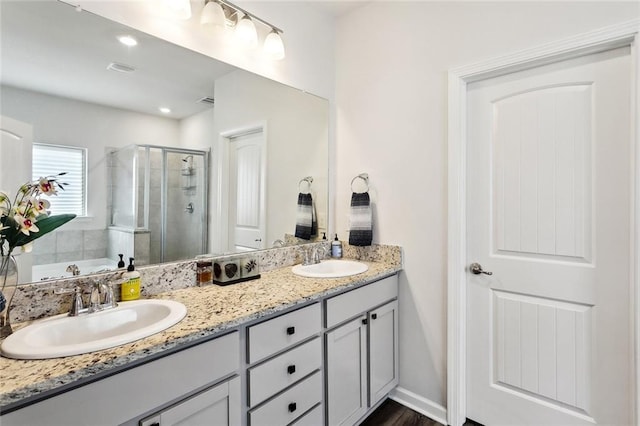 40315 Cypress Reserve Blvd, Ponchatoula, LA 70454 - bathroom with a shower stall, double vanity, and a garden tub