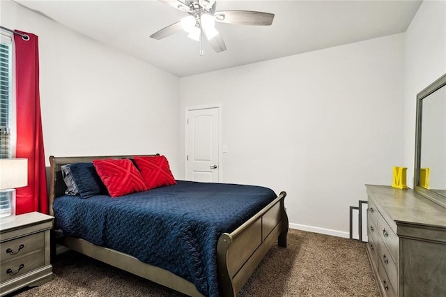40315 Cypress Reserve Blvd, Ponchatoula, LA 70454 - bedroom with dark carpet, baseboards, and a ceiling fan