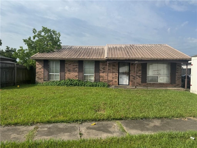 149 Becky Dr, Avondale, LA 70094 - single story home with brick siding and metal roof